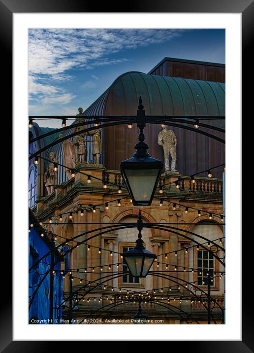 Dusk view of a classical building with a street lamp in the foreground and decorative lights, evoking a romantic urban scene in Harrogate, England. Framed Mounted Print by Man And Life