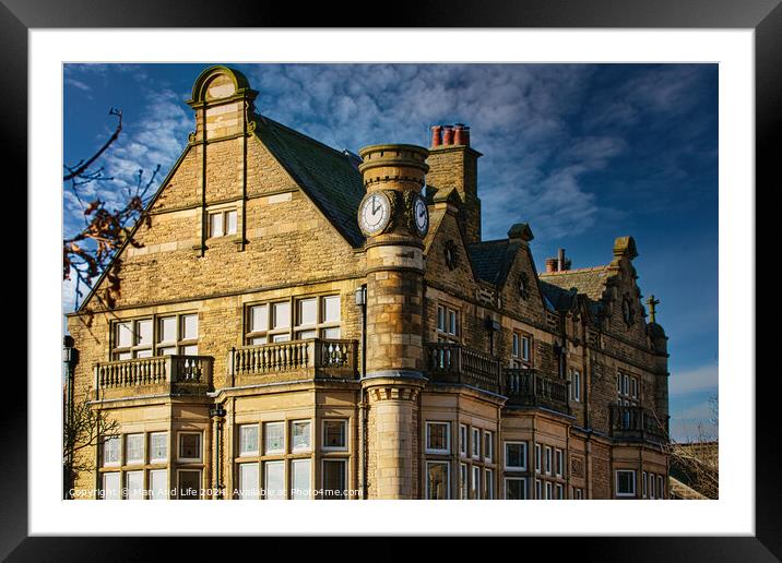 Historic stone building with clock tower under blue sky in Harrogate, England. Framed Mounted Print by Man And Life