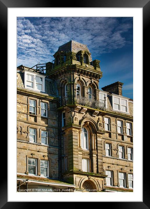 Victorian architecture with ornate details on a historic building against a blue sky with clouds in Harrogate, England. Framed Mounted Print by Man And Life