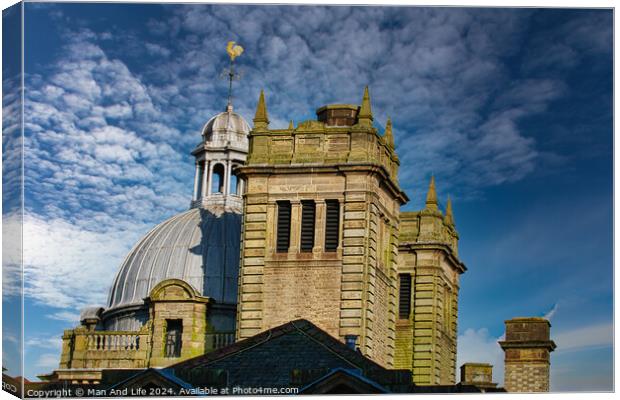Historic stone building with a dome under a blue sky with clouds in Harrogate, England. Canvas Print by Man And Life