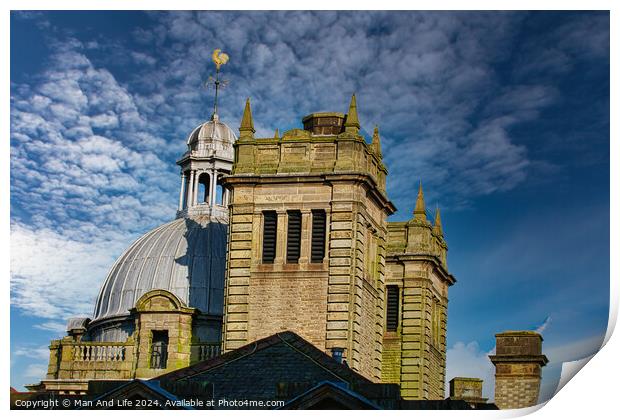 Historic stone building with a dome under a blue sky with clouds in Harrogate, England. Print by Man And Life