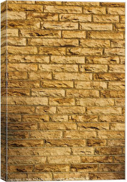 Seamless texture of a yellow brick wall, perfect for background or pattern use in design projects . Canvas Print by Man And Life
