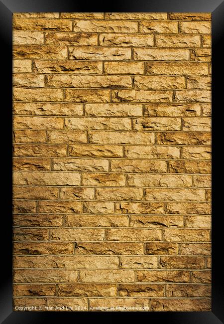 Seamless texture of a yellow brick wall, perfect for background or pattern use in design projects . Framed Print by Man And Life