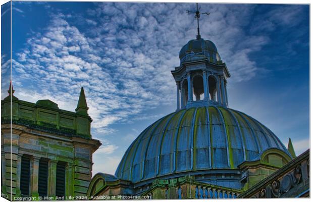 Dramatic sky over an architectural dome with intricate details and historical design in Harrogate, England. Canvas Print by Man And Life