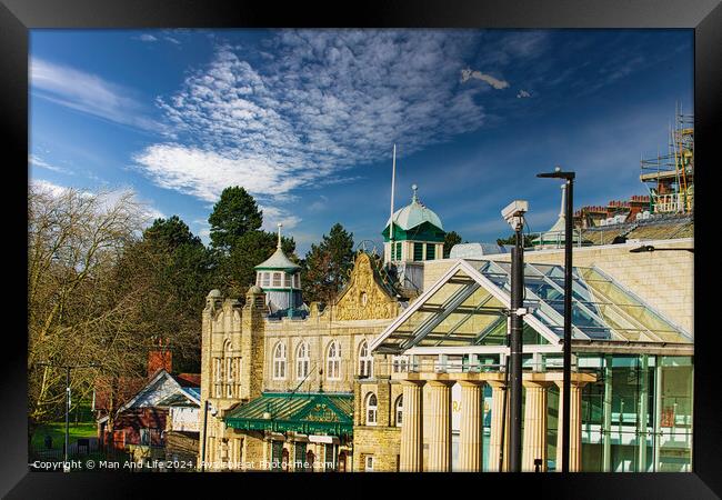 Sunny day over historic buildings with blue sky and fluffy clouds in Harrogate, England. Framed Print by Man And Life
