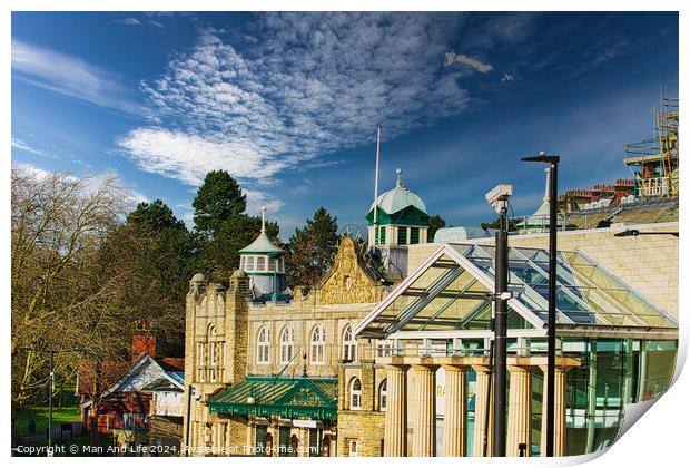 Sunny day over historic buildings with blue sky and fluffy clouds in Harrogate, England. Print by Man And Life