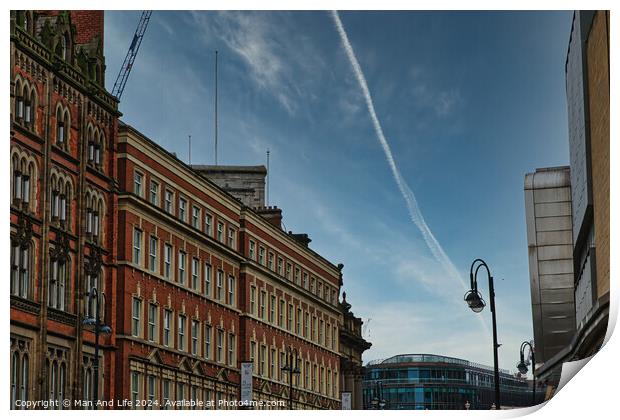 Urban street view with historic buildings under a clear blue sky with contrails in Leeds, UK. Print by Man And Life