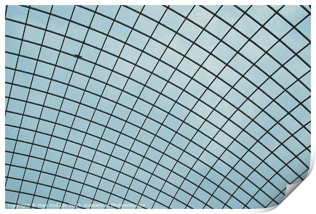 Abstract geometric pattern of a glass ceiling against a clear blue sky. Print by Man And Life