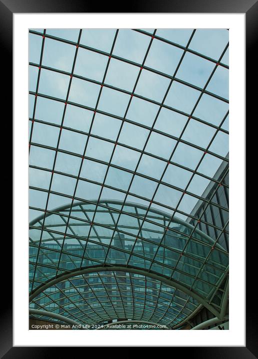 Modern glass ceiling architecture with geometric pattern against a blue sky in Leeds, UK. Framed Mounted Print by Man And Life