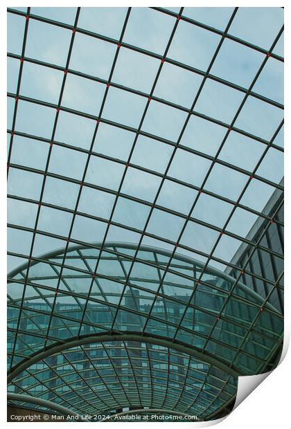 Modern glass ceiling architecture with geometric pattern against a blue sky in Leeds, UK. Print by Man And Life