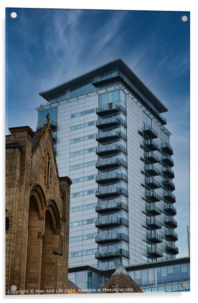 Contrast of old and new architecture with a modern glass skyscraper towering behind a traditional stone church under a clear blue sky in Leeds, UK. Acrylic by Man And Life