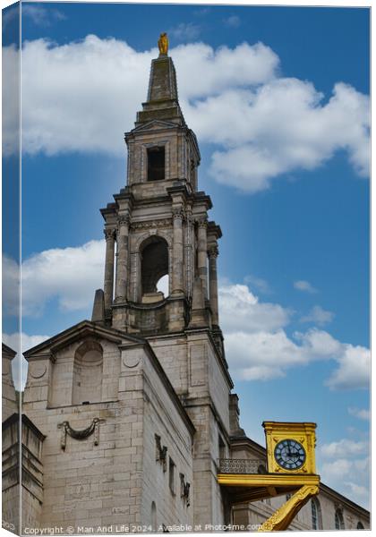 Historic church steeple with clock under a blue sky with clouds in Leeds, UK. Canvas Print by Man And Life