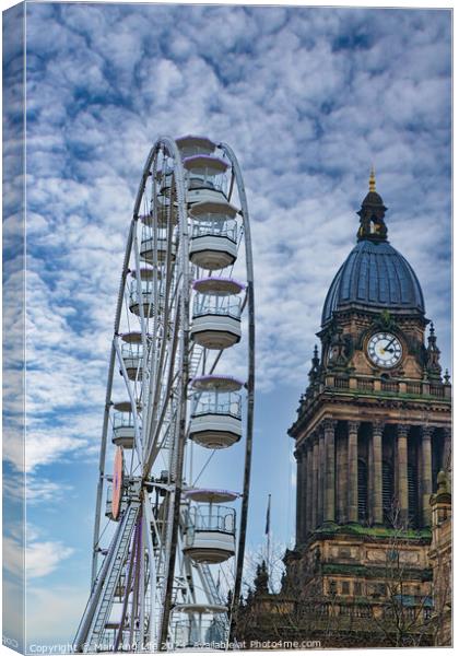 Ferris wheel beside a historic clock tower under a cloudy sky in Leeds, UK. Canvas Print by Man And Life