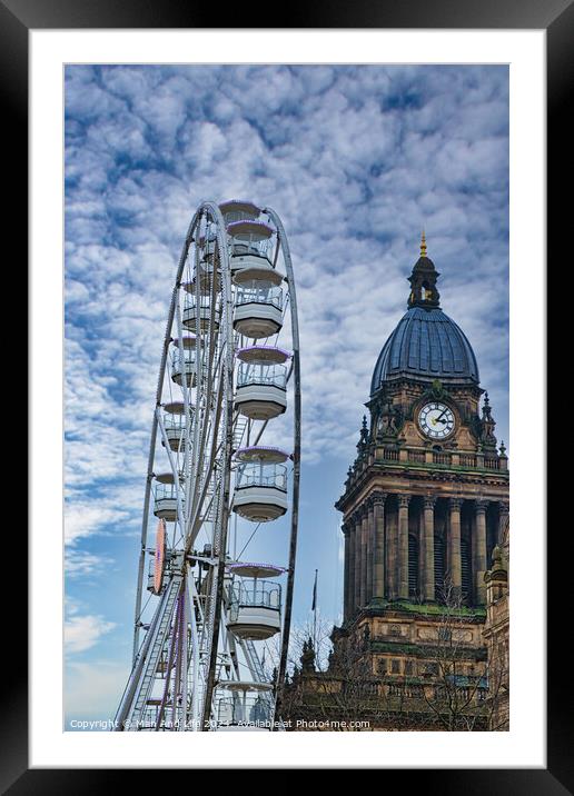 Ferris wheel beside a historic clock tower under a cloudy sky in Leeds, UK. Framed Mounted Print by Man And Life