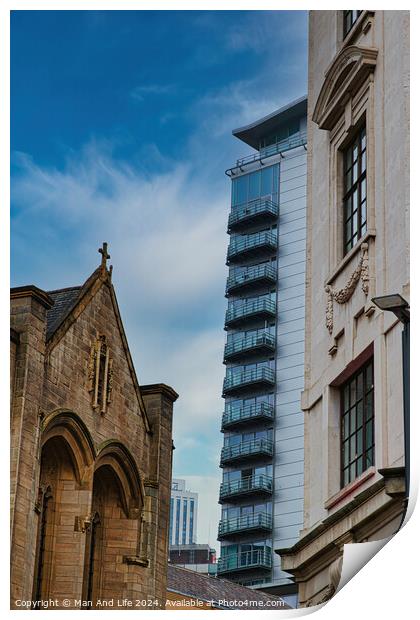 Contrast of old and new architecture with a historic church in the foreground and a modern skyscraper in the background against a blue sky in Leeds, UK. Print by Man And Life