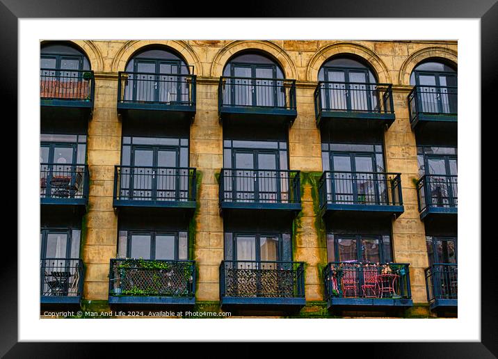 Facade of a vintage building with ornate windows and balconies in Leeds, UK. Framed Mounted Print by Man And Life