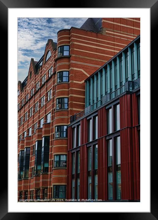Modern urban architecture with red brick and glass facade against a cloudy sky in Leeds, UK. Framed Mounted Print by Man And Life