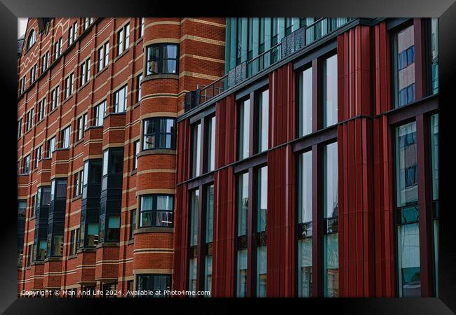 Modern building facade with a pattern of red and brown rectangular windows and panels, architectural background in Leeds, UK. Framed Print by Man And Life