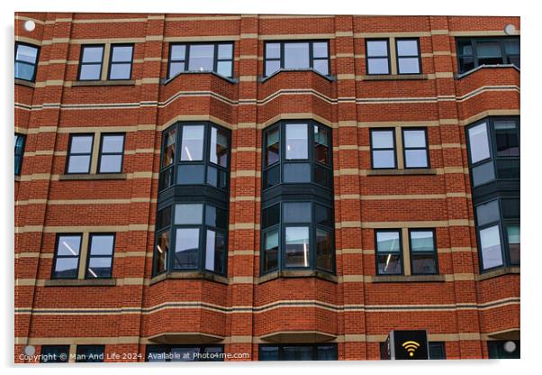 Modern brick building facade with patterned windows and architectural details in Leeds, UK. Acrylic by Man And Life