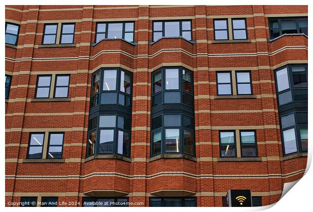 Modern brick building facade with patterned windows and architectural details in Leeds, UK. Print by Man And Life