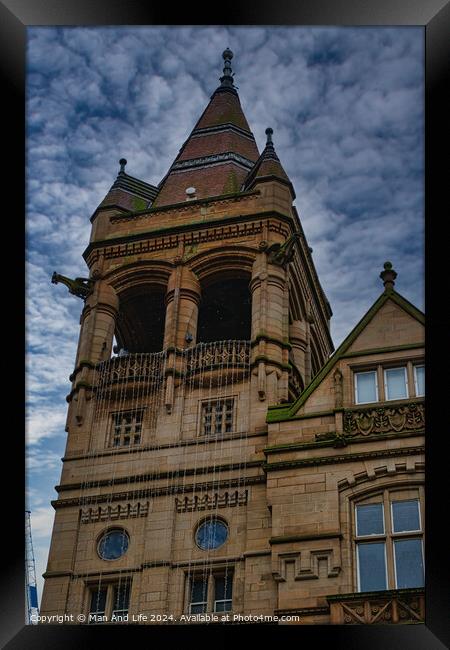 Victorian architecture with a detailed tower under a cloudy sky in Leeds, UK. Framed Print by Man And Life