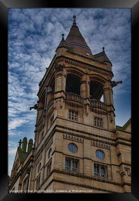 Gothic style tower against a dramatic cloudy sky in Leeds, UK. Framed Print by Man And Life