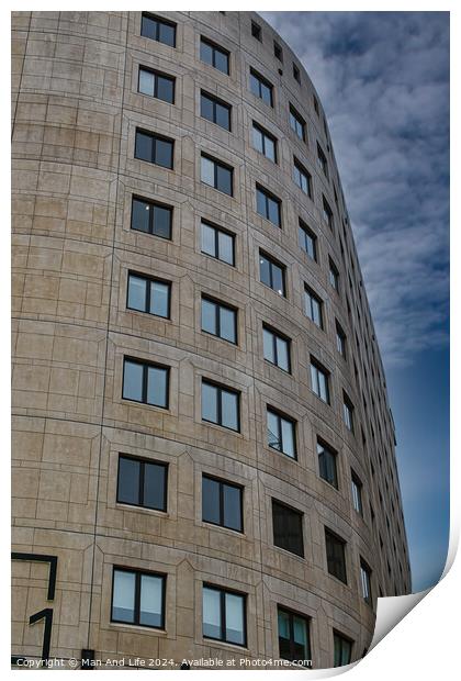 Curved modern office building facade with symmetric windows against a cloudy sky in Leeds, UK. Print by Man And Life