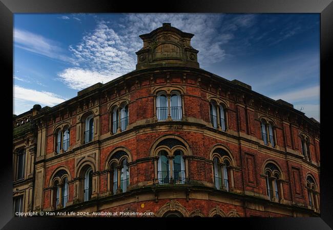 Victorian architecture with ornate windows against a cloudy sky in Leeds, UK. Framed Print by Man And Life