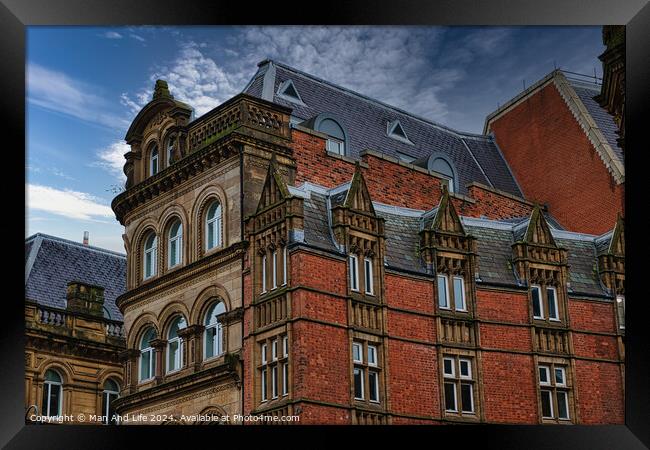 Victorian architecture with ornate details and blue sky in Leeds, UK. Framed Print by Man And Life