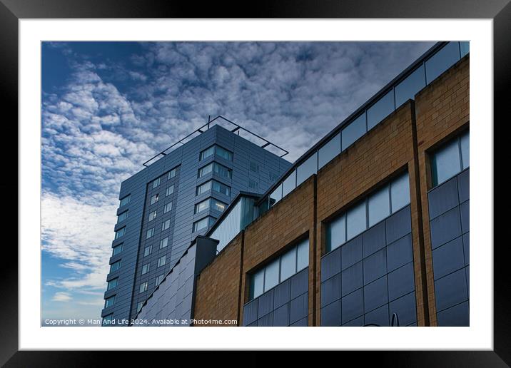 Modern urban architecture with blue sky and clouds in Leeds, UK. Framed Mounted Print by Man And Life