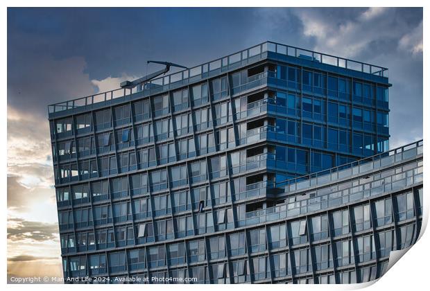 Modern office building facade against a dramatic sunset sky in Liverpool, UK. Print by Man And Life