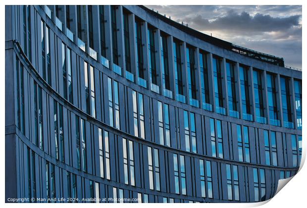 Modern office building facade with reflective glass windows against a cloudy sky at dusk in Liverpool, UK. Print by Man And Life