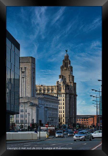 Urban cityscape with historic architecture and modern buildings under a blue sky with wispy clouds in Liverpool, UK. Framed Print by Man And Life