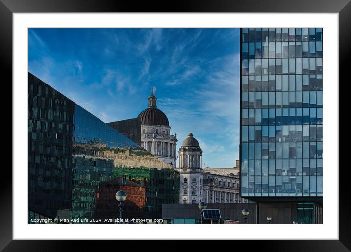 Urban contrast with old dome architecture beside modern glass building under a blue sky with wispy clouds in Liverpool, UK. Framed Mounted Print by Man And Life