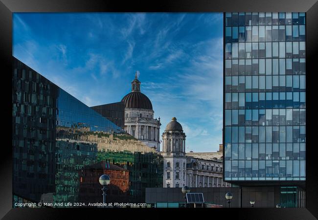 Urban contrast with old dome architecture beside modern glass building under a blue sky with wispy clouds in Liverpool, UK. Framed Print by Man And Life