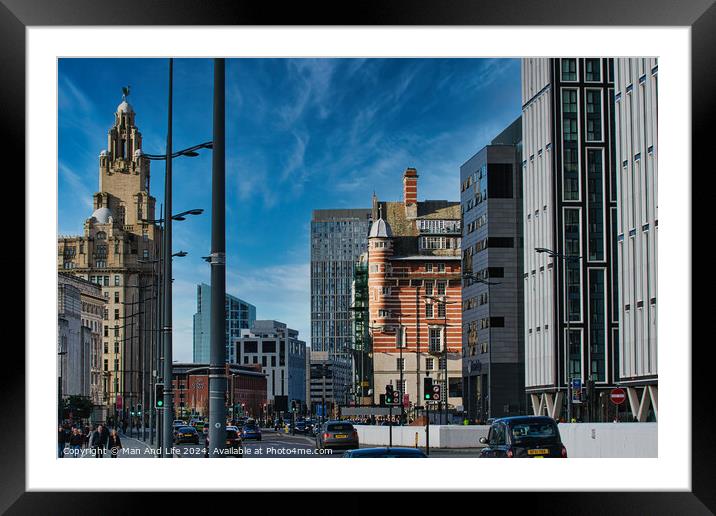 Urban cityscape with modern and historic architecture under a clear blue sky in Liverpool, UK. Framed Mounted Print by Man And Life