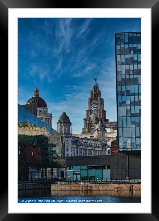 Contrast of old and new architecture with historic buildings and modern glass skyscraper against a blue sky with wispy clouds in Liverpool, UK. Framed Mounted Print by Man And Life