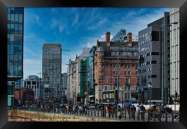 Modern cityscape with diverse architecture and pedestrians on a sunny day in Liverpool, UK. Framed Print by Man And Life