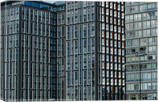 Modern glass office buildings with a pattern of windows reflecting the sky, showcasing urban architecture in Liverpool, UK. Canvas Print by Man And Life