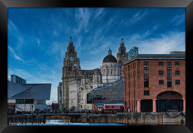 Liverpool waterfront with historic buildings and blue sky Framed Print by Man And Life