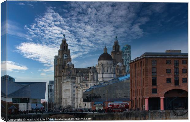 Dramatic sky over historic city buildings with modern architecture in the foreground in Liverpool, UK. Canvas Print by Man And Life