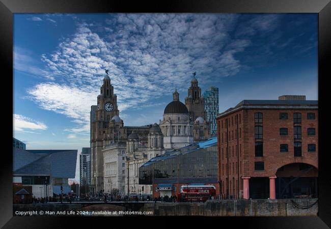 Dramatic sky over historic city buildings with modern architecture in the foreground in Liverpool, UK. Framed Print by Man And Life