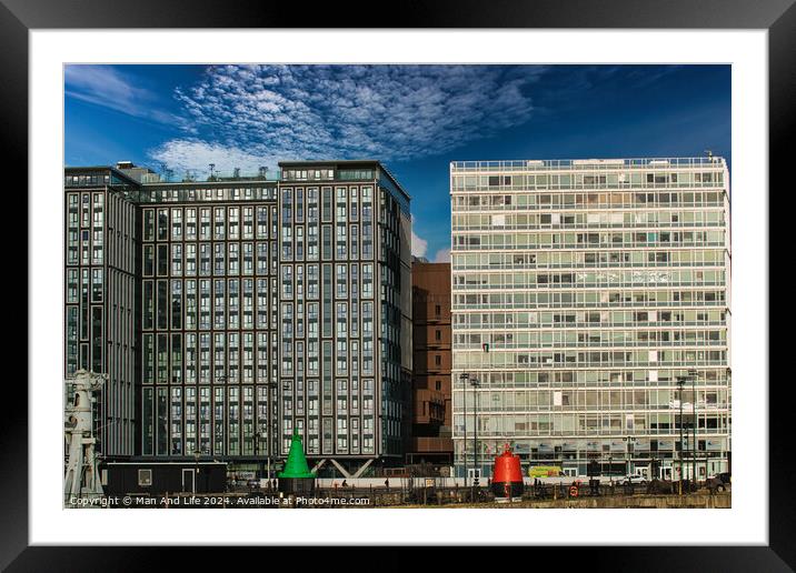 Modern office buildings with reflective glass facades under a blue sky with scattered clouds in Liverpool, UK. Framed Mounted Print by Man And Life