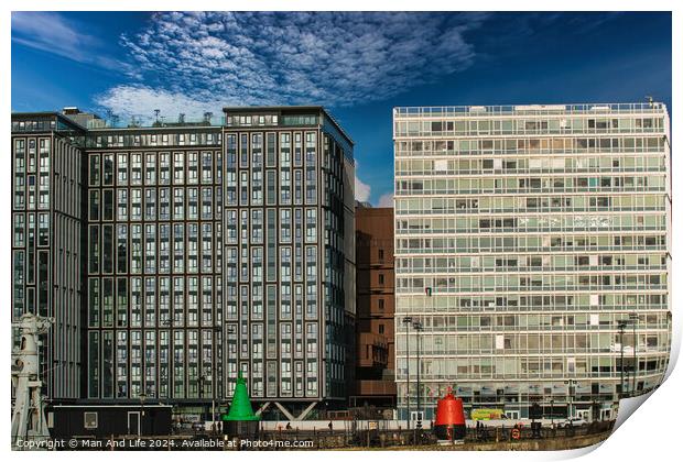 Modern office buildings with reflective glass facades under a blue sky with scattered clouds in Liverpool, UK. Print by Man And Life