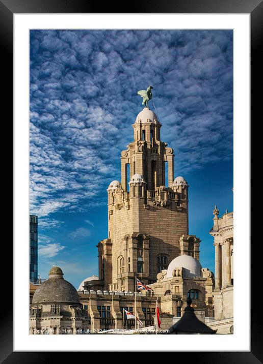 Historic building with a statue on top under a blue sky with clouds in Liverpool, UK. Framed Mounted Print by Man And Life