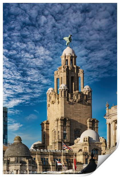 Historic building with a statue on top under a blue sky with clouds in Liverpool, UK. Print by Man And Life