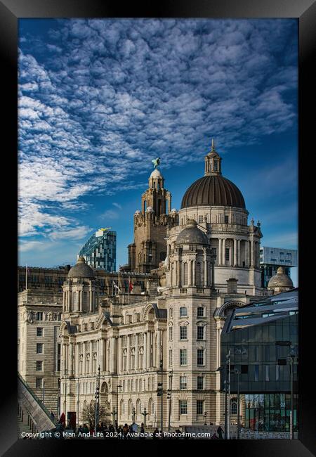 Dramatic sky over historic city buildings with intricate architecture in Liverpool, UK. Framed Print by Man And Life
