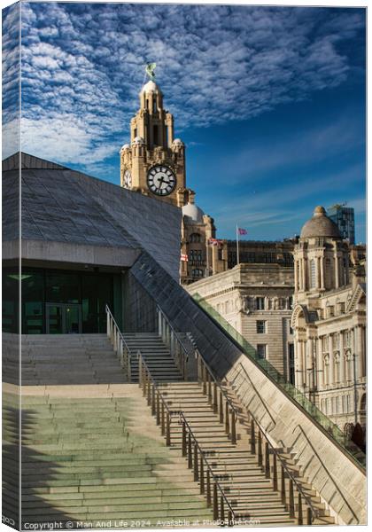 Modern staircase leading to historic clock tower under a blue sky with wispy clouds in Liverpool, UK. Canvas Print by Man And Life