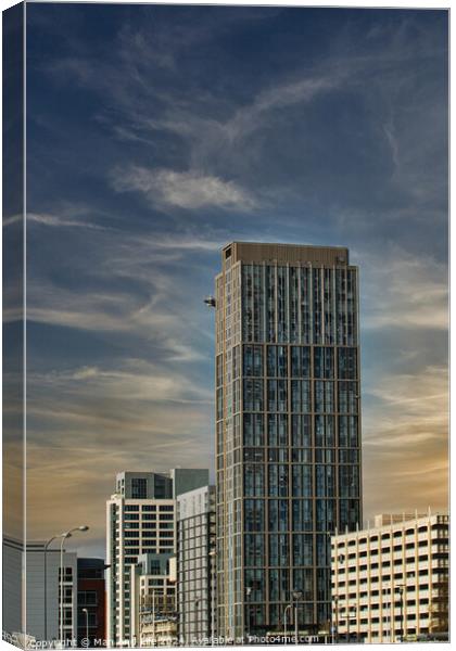 Modern skyscraper against a blue sky with clouds, showcasing contemporary urban architecture in Liverpool, UK. Canvas Print by Man And Life