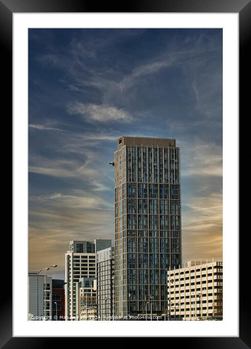 Modern skyscraper against a blue sky with clouds, showcasing contemporary urban architecture in Liverpool, UK. Framed Mounted Print by Man And Life